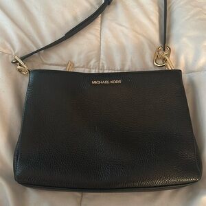 Michael Kors Trisha Medium Pebbled Leather Crossbody Bag in Black.